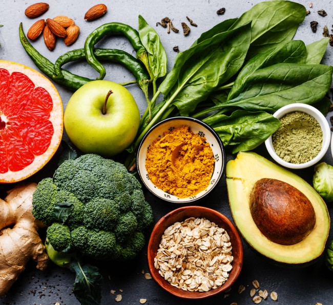 Display of foods that contain fiber such as broooli and nuts.